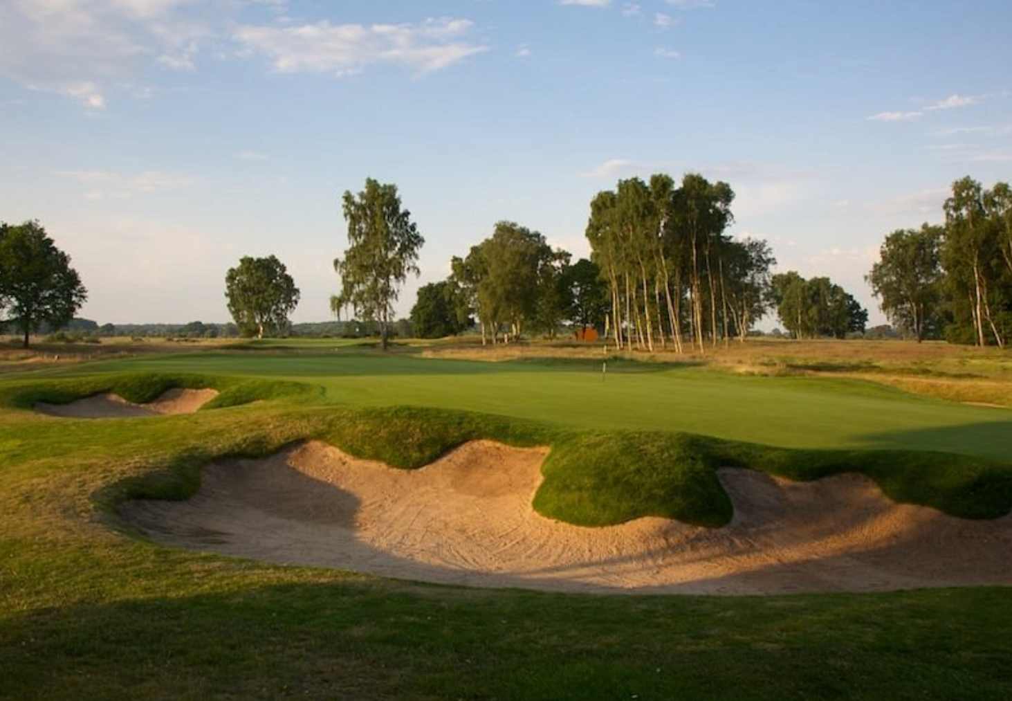 Photo of a green and bunker at Fullford Golf Club