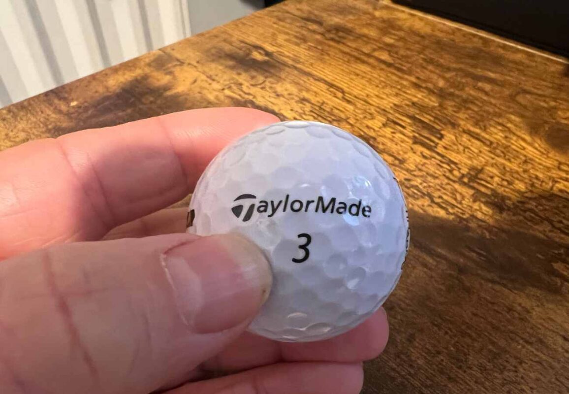 Taylormade golf ball with number 3 on it